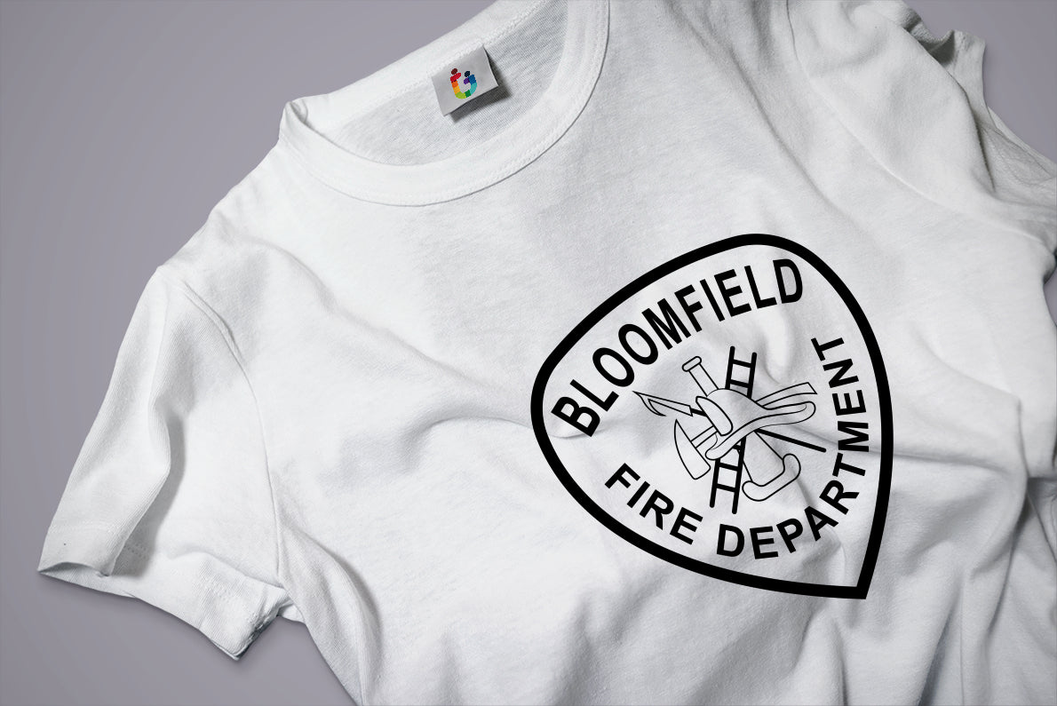 White t-shirt with Bloomfield Fire Department logo on a gray background