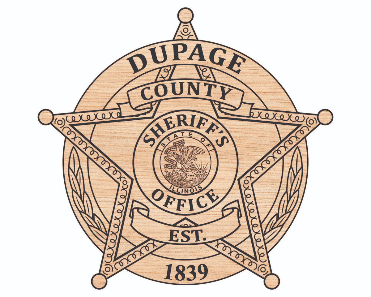 A circular five-point star sheriff's badge design with engraved woodgrain texture, reading 'DUPAGE COUNTY SHERIFF'S OFFICE' and 'EST. 1839', centered on a plain white background.