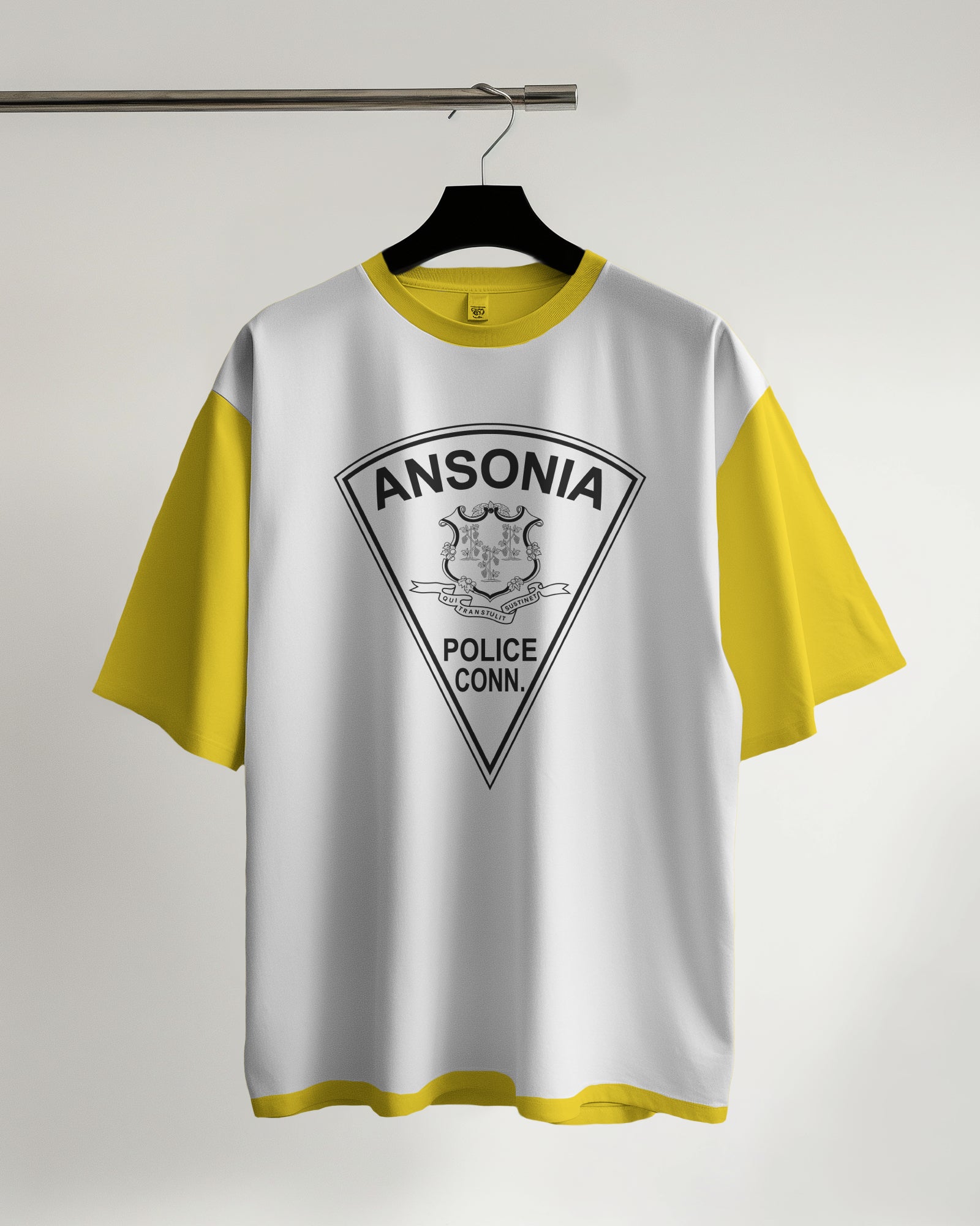 White t-shirt with yellow sleeves featuring 'Ansonia Police Conn' design on a hanger against a white background.
Ansonia Police Conn' t-shirt design