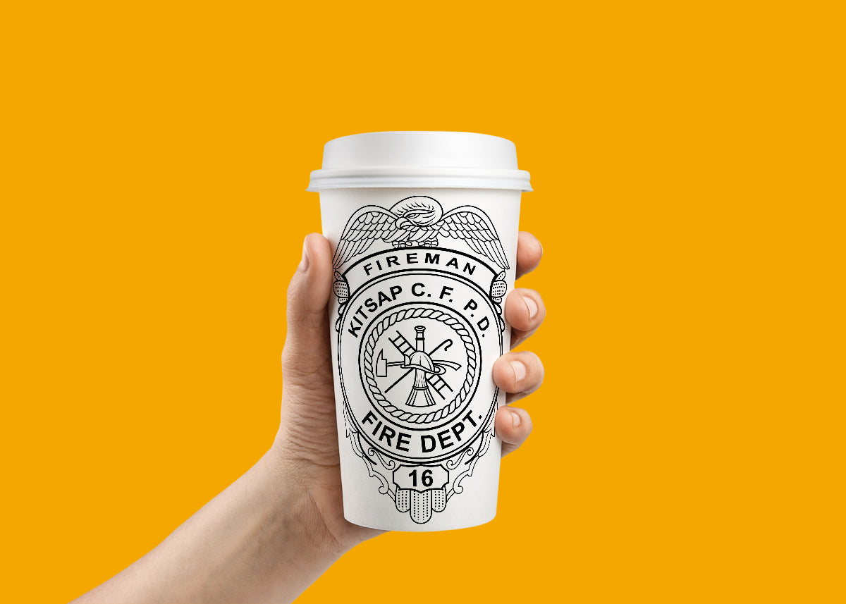 Hand holding a coffee cup with a fire department logo against an orange background
fire badge mockup with coffee mug