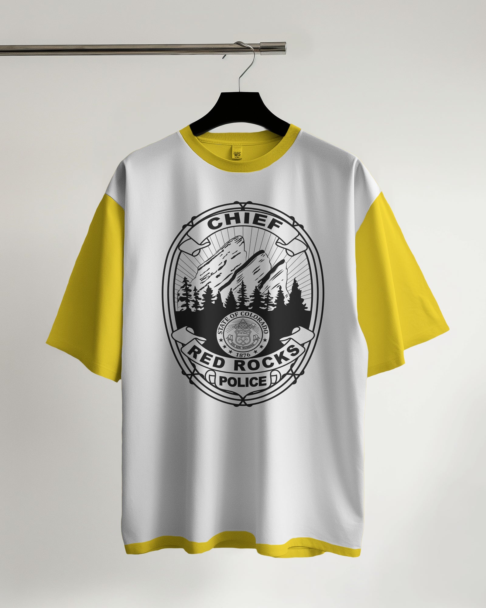 White t-shirt with yellow sleeves featuring a black logo on a hanger against a white background
