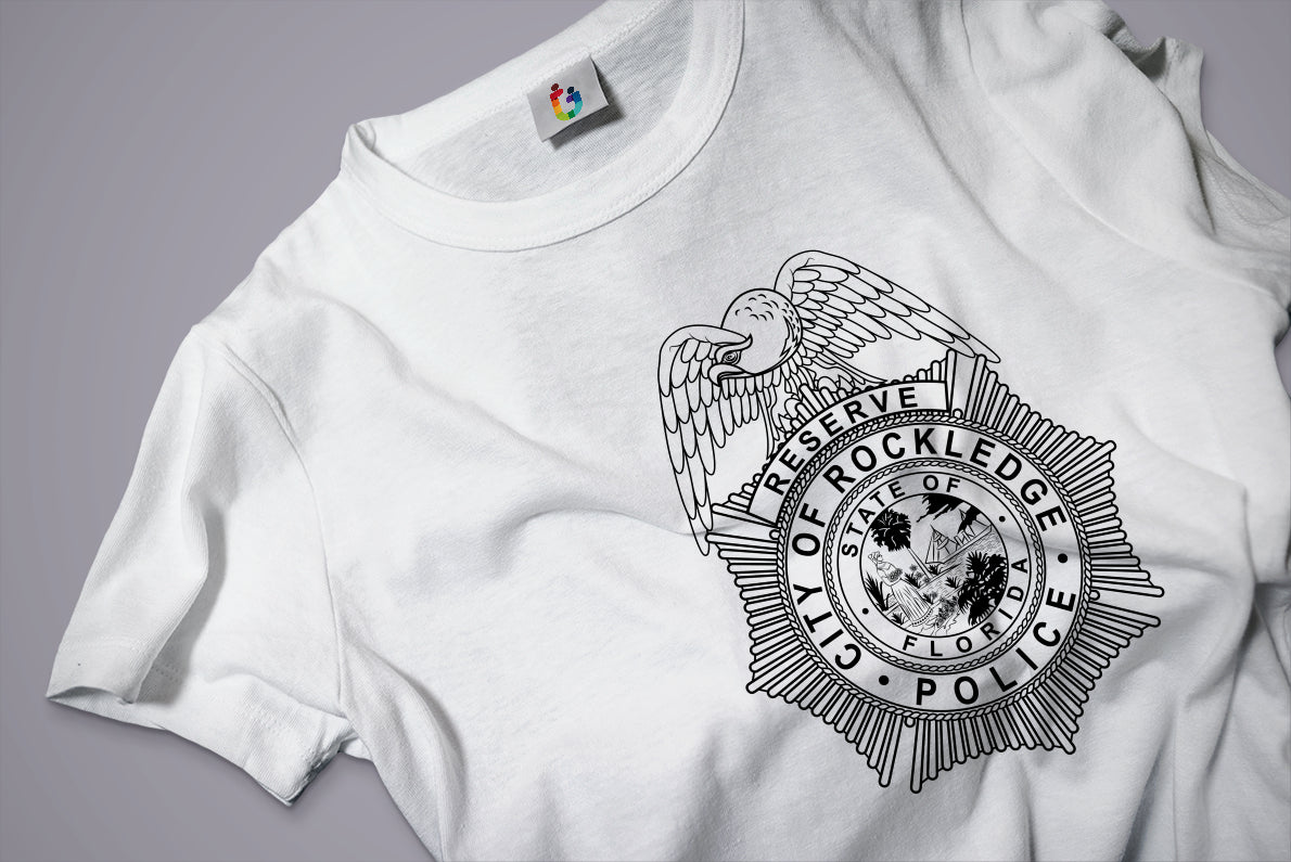 White t-shirt with a black police badge design. 
 t-shirt with a black police badge 
 t-shirt print police badge 