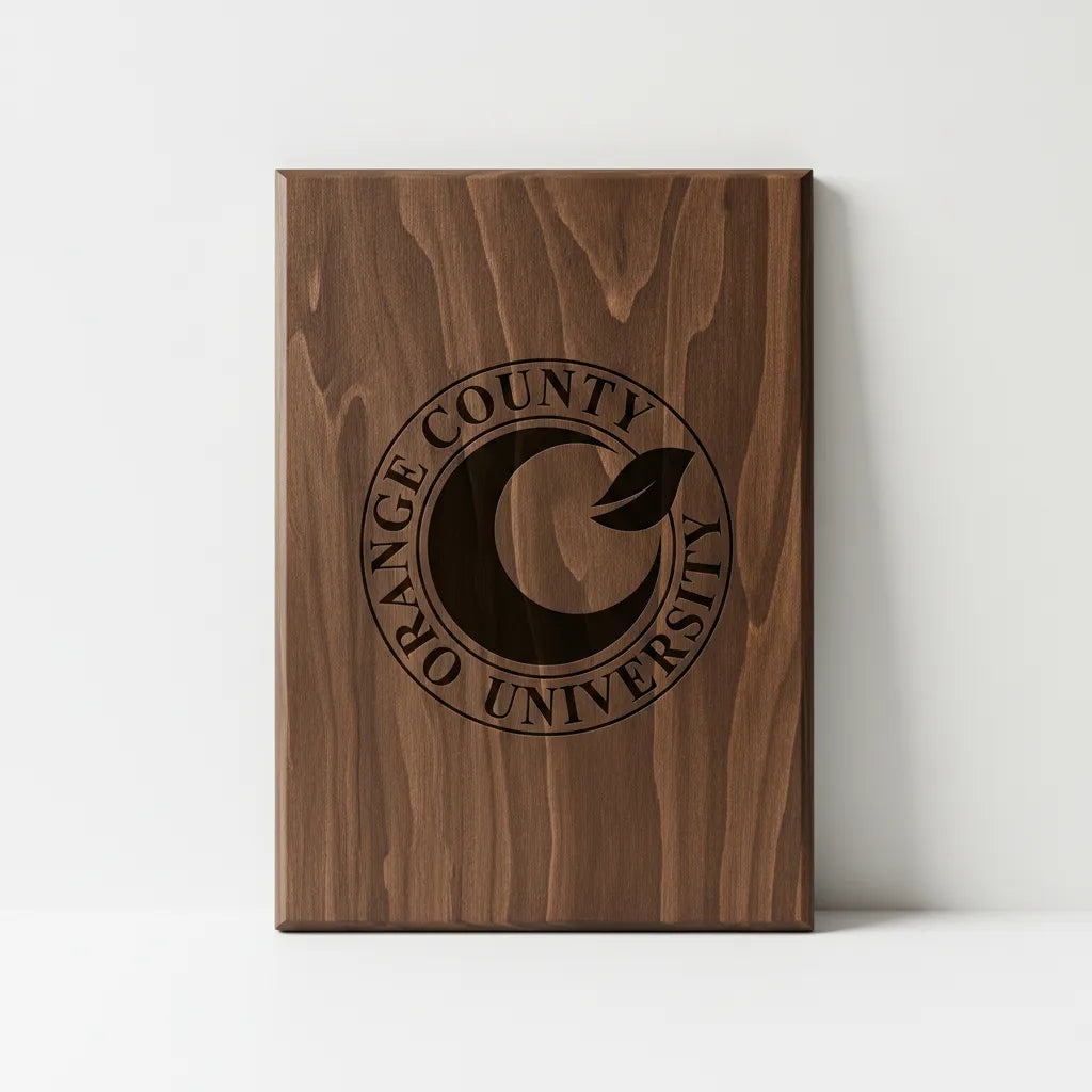 Wooden plaque with 'Orange County University' engraved on a white background